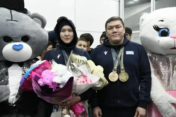 Столичные спортсмены, защищавшие честь страны в Японии, вернулись домой (5)