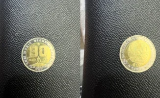 Споры в Казнете: редкая монета в 200 тенге с цифрой '80' вызывает ажиотаж и обсуждения среди пользователей