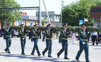 Арыс празднует защитников: награды и патриотизм!